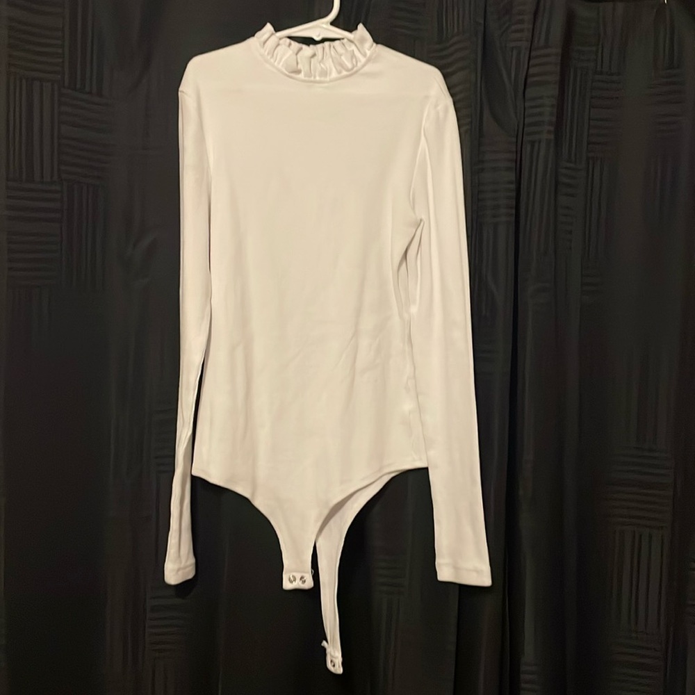 White ruffled short turtleneck bodysuit